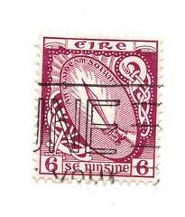 A vintage postage stamp from Ireland isolated on a white background.