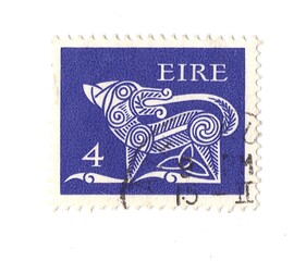 A vintage postage stamp from Ireland isolated on a white background.