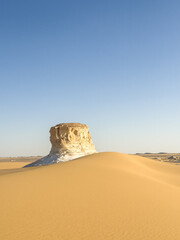 White rock formations and sand dunes in Egypt's White Desert, natural desert landscape	