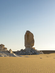 White rock formations and sand dunes in Egypt's White Desert, natural desert landscape	