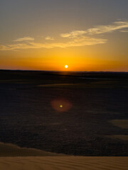 Beautiful sunset over sand dunes in the White Desert in Egypt	