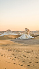 White rock formations and sand dunes in Egypt's White Desert, natural desert landscape	