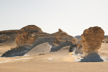 White rock formations and sand dunes in Egypt's White Desert, natural desert landscape	