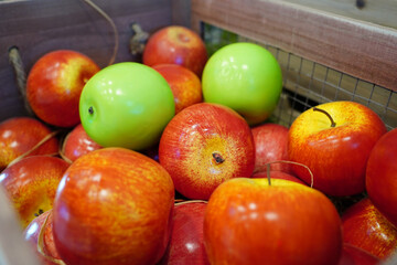 Colorful Artificial Apples in a Wooden Crate for Decoration