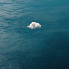 Single cloud over still ocean