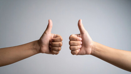 Double Thumbs Up Gesture on Gray Background