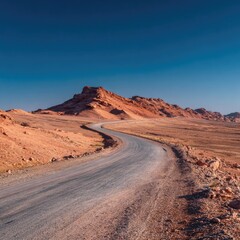 Desert road winding uphill