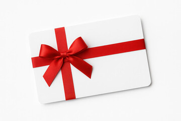 blank white gift card with red ribbon band isolated on white