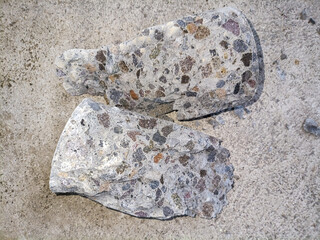 A broken concrete core sample after a compressive strength test. It's clearly display the internal...