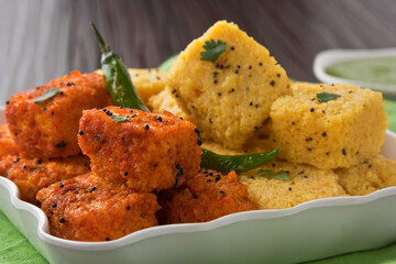 Vadodara, Gujarat / India - January 07, 2015 : Spicy Khaman, an Indian snack.