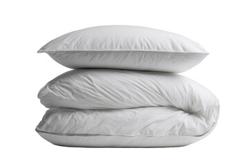 Two white pillows atop a folded duvet
