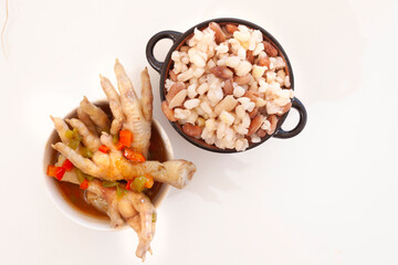 Chicken feet and 'samp' with beans on white