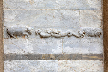 Carving on the Leaning Tower of Pisa, Italy