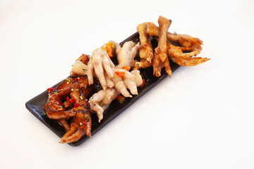 Different ways to cook chicken feet isolated on white