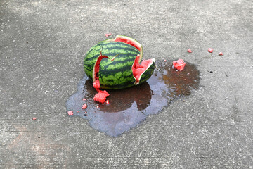 Close-up of a broken watermelon on the ground