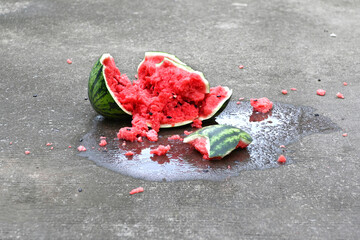 Close-up of a broken watermelon on the ground