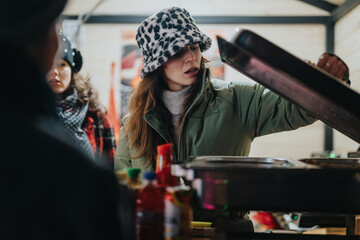 A group of friends in a winter setting wearing warm clothes, sharing moments and exploring hot dishes at a market stand, emphasizing joy, togetherness, and winter fun.