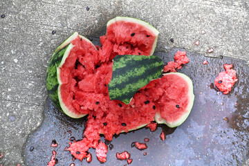 Close-up of a broken watermelon on the ground