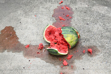 Close-up of a broken watermelon on the ground