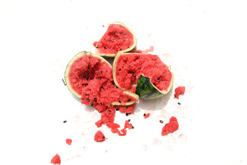 Close-up of a broken watermelon isolated on a white background