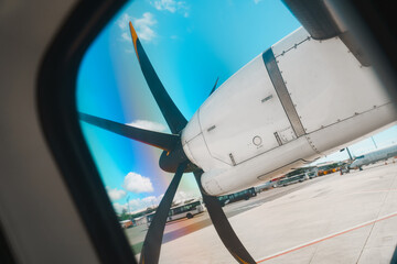 Side View of Turboprop Plane on Airport Runway – Francisco Reyes Airport Coron – Palawan,...