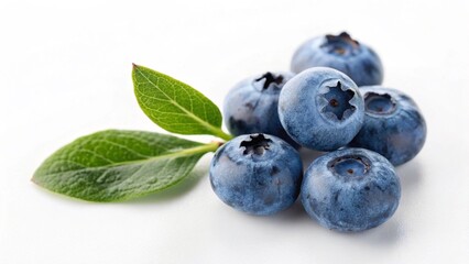 A small cluster of ripe blueberries with green leaves isolated on white background