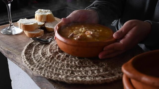 Traditional Argentine locro. Creole locro. It is a hot, nutritious meal with protein. Ideal for cold seasons. Locro with beans, corn, pumpkin, onion, sausages, red sausages.
