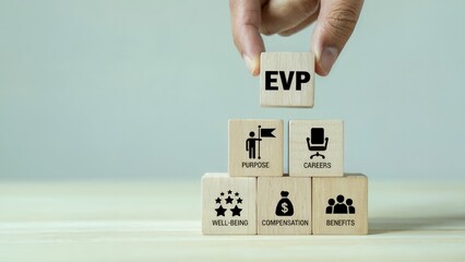 Hand places EVP block, visualizing employee value proposition benefits