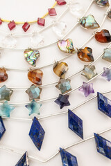 Colorful Gemstone Beads Featuring Garnet, Crystal Quartz, Shell, Montana Agate, Fluorite, and Lapis...