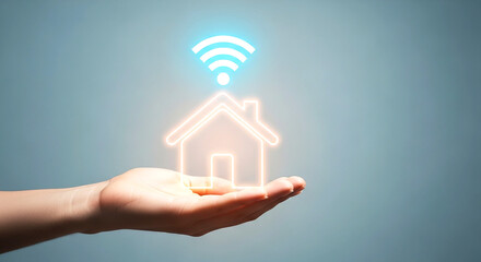 Hand holding glowing home icon with wifi signal representing smart home automation and connectivity