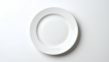 Empty white plate with overhead view.
