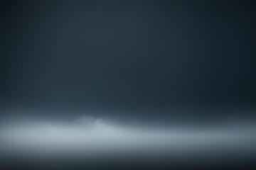Minimalist dark foggy background with soft mist