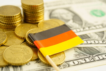 Germany flag on coin and banknote money, finance trading investment business currency concept.