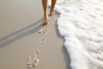 Walking Barefoot on the Beach