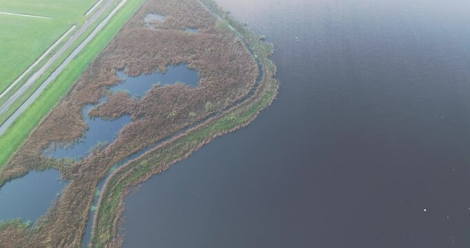 Aerial view of countryside of De Peel and Mussenbaan in snow, Asten, Netherlands