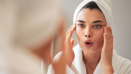 Woman is doing face yoga	