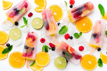 Colorful Fruit Popsicles with Citrus and Berries