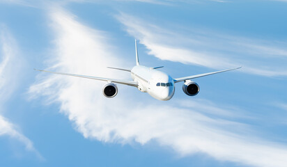 White passenger airplane flying in the sky amazing clouds in the background - Travel by air...