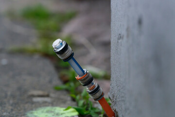 Fiber optic connection was installed between the footpath at paving stones and the house wall