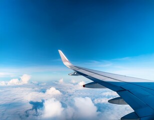 Obraz premium airplane wing in the blue sky