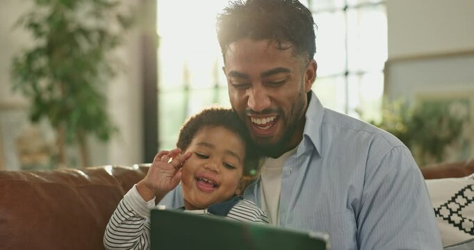 Watching, cartoons and man with child, tablet and bonding in home, laugh or streaming comedy on web. Happy, person and smile with toddler in living room, online and funny film on app, father and son