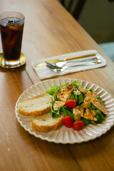 chicken breast with salad