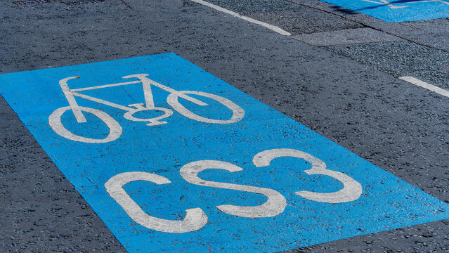 CS3 cycle lane road marking on wet tarmac