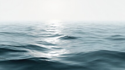 Fototapeta premium Serene Ocean Water Surface Calm Beach Scene with Gentle Waves and Sunlight Reflecting on the Water at Dawn