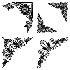 Collection of four ornate corner designs featuring floral and swirling leaf elements in a black silhouette