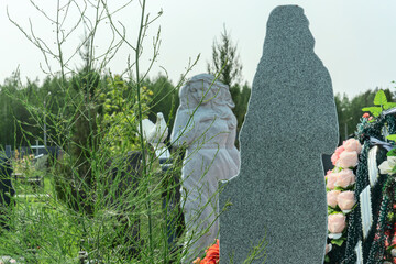 Graveyard with ancient monuments. Whispers of love and loss in a tranquil graveyard filled with...