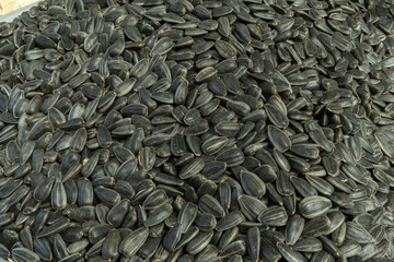 Closeup of sunflower seeds. The intricate beauty and potential of sunflower seeds. Sales of...
