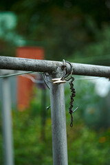 An old iron clothes hanger in a Soviet courtyard