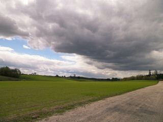 Green fields and hills in Wiezyca, Kashubian Region, Poland.