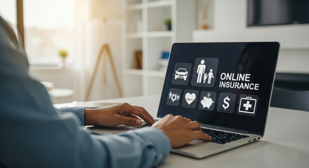 Person Using Laptop To Access Online Insurance Services